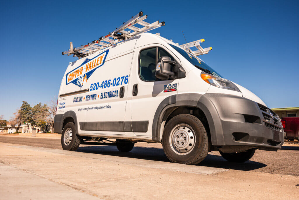 Branded HVAC service van representing trusted AC service Tucson professionals, ready to provide air conditioning maintenance, repair, and installation services.