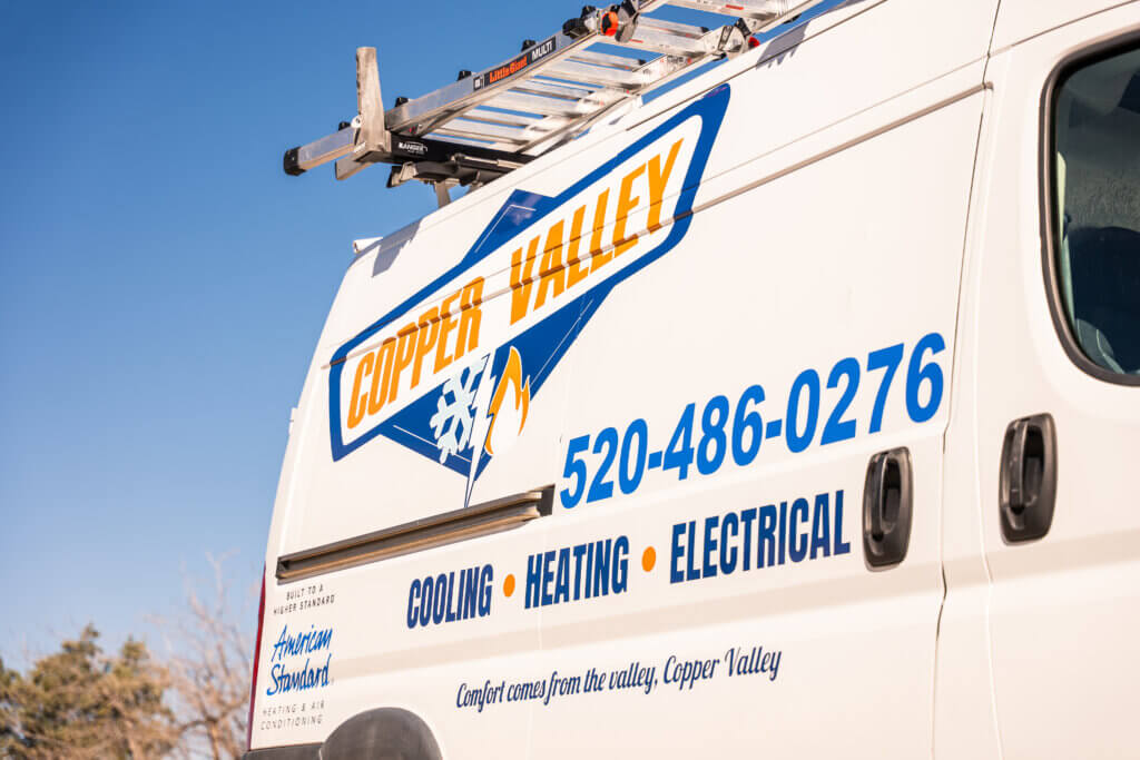 Branded service vehicle representing trusted air conditioning service Tucson professionals, ready to provide expert cooling system maintenance, repair, and installation.